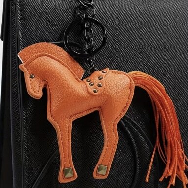 ORANGE MOOD keychain symbol of 2026 ORANGE MOOD keychain symbol of 2026